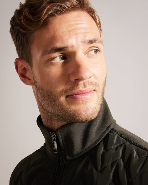 HAMSTE-Tops-Wrapping up never looked better. The HAMSTE jacket features a quilted front and funnel neck to keep out the breeze. Ideal for crisp morning walks and after work pints. Jacket Chevron quilted front Long sleeves Zip fastening Funnel neck Pockets Lewis is 6'2" / 1.88m and wears Navy in a Ted size 3- Ted Baker Romania
